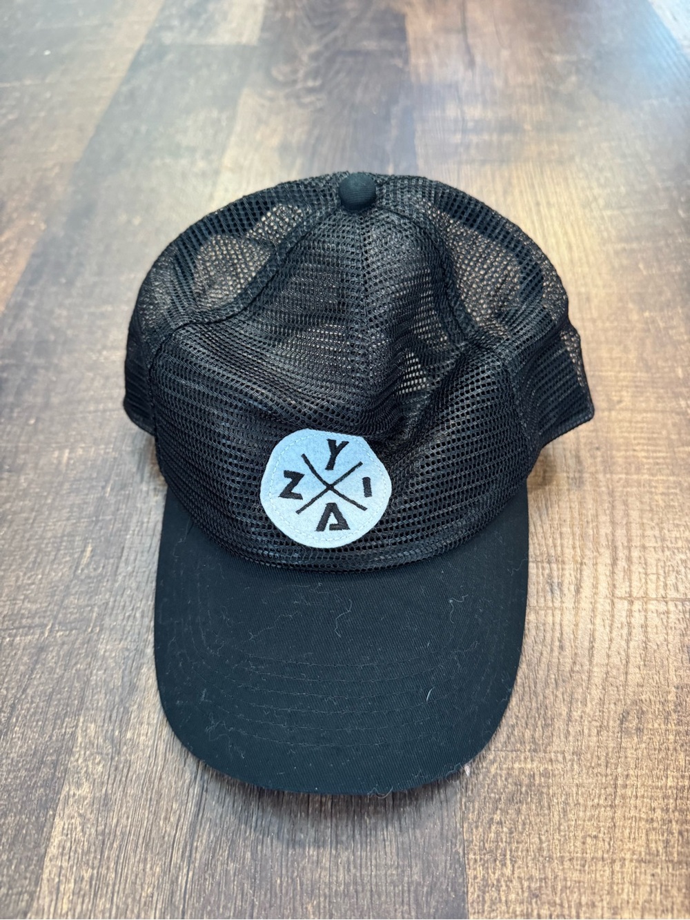 Zyia Black Mesh Trucker Hat